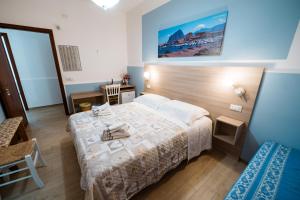 Posteľ alebo postele v izbe v ubytovaní B&B Profumi di Sicilia