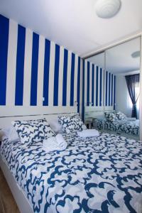 Postel nebo postele na pokoji v ubytování Udoban kutak blizu centra Apartman Mala Punta