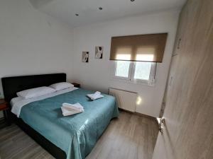 Кровать или кровати в номере Villaggio traditional living