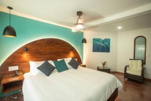 Кровать или кровати в номере Hotel El Velero