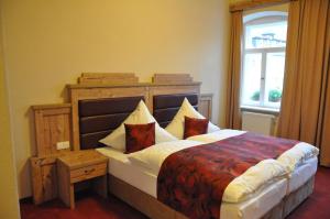 Postel nebo postele na pokoji v ubytování Hotel Goldner Löwe + 1 fotografie