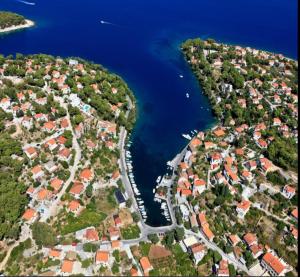 an aerial view of a city and the water at Apartment Karla in Splitska +29 photos