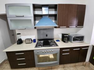 Köök või kööginurk majutusasutuses Casa céntrica, en privada con acceso controlado