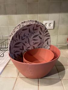 a mixing bowl sitting on top of a counter at Rare 2 bedroom with private beach on Lake Annecy in Doussard