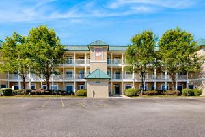 a large building with a parking lot in front of it at Summerlyn Condo --- 34363 Summerlyn Dr 204 in Lewes