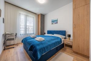 Ένα ή περισσότερα κρεβάτια σε δωμάτιο στο Csengery Residence