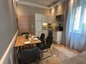 Kuchyňa alebo kuchynka v ubytovaní Book-A-Room Salzburg Apartment 31