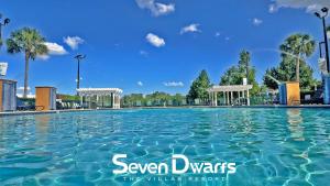 a swimming pool at the savoy towers resort at Villas at Seven Dwarfs Resort - Near to Disney in Kissimmee