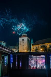 a fireworks display in the sky over a building at Timeout Heritage Hotel Zagreb in Zagreb
