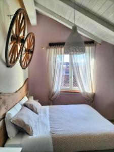 Postel nebo postele na pokoji v ubytování LOCANDA VECCHIO NOVECENTO + 17 fotografií