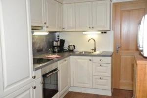 Η κουζίνα ή μικρή κουζίνα στο Ferienwohnung Tschaneck in Sankt Michael im Lungau
