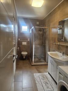 Phòng tắm tại Elite Apartment Jasmina +18 ảnh