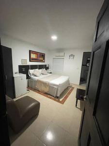 Voodi või voodid majutusasutuse Hotel Plaza Norte Cali toas
