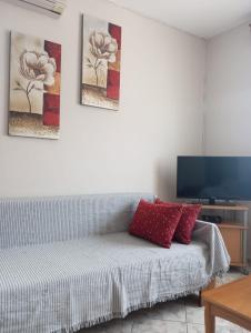 TV a/nebo společenská místnost v ubytování Sia Beach House