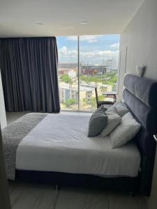 Postel nebo postele na pokoji v ubytování Hotel OR Suite