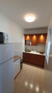 Kuchyňa alebo kuchynka v ubytovaní BerBe Apartman