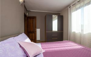 Łóżko lub łóżka w pokoju w obiekcie Holiday Home Vrsar 38