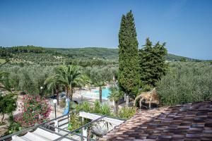 a view of a resort with a pool and trees at vila SEJUDA Alberghetto in Peschici