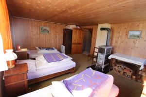 Ein Bett oder Betten in einem Zimmer der Unterkunft Plans