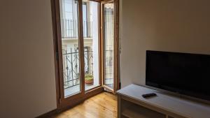 TV a/nebo společenská místnost v ubytování Apartamento Ábside de San Juan III