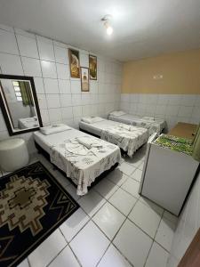 Postel nebo postele na pokoji v ubytování Pousada Shalon Olinda + 15 fotografií