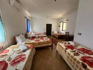 Postel nebo postele na pokoji v ubytování Prek bjeshka guesthouse