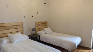 Postel nebo postele na pokoji v ubytování Apartamento Ábside de San Juan I