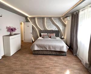 Postel nebo postele na pokoji v ubytování S class apartment