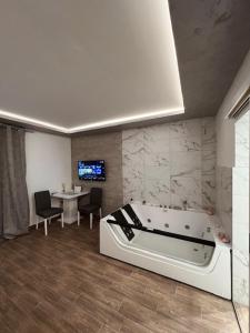 TV a/nebo společenská místnost v ubytování S class apartment