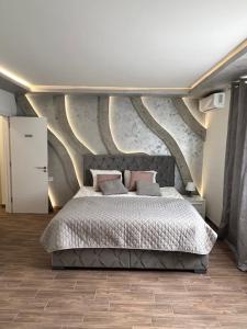 Postel nebo postele na pokoji v ubytování S class apartment