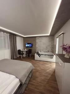Postel nebo postele na pokoji v ubytování S class apartment