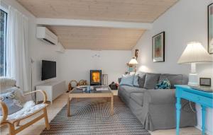 TV a/nebo společenská místnost v ubytování Holiday Home Jomfrustien Nexø I