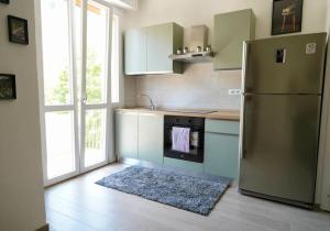 Kuchyň nebo kuchyňský kout v ubytování Molinari House Modena Smeraldo