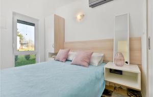 Postel nebo postele na pokoji v ubytování Three-Bedroom Holiday Home In Durdevac