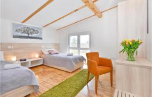 Postel nebo postele na pokoji v ubytování Three-Bedroom Holiday Home In Durdevac