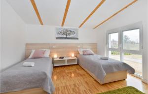 Postel nebo postele na pokoji v ubytování Three-Bedroom Holiday Home In Durdevac