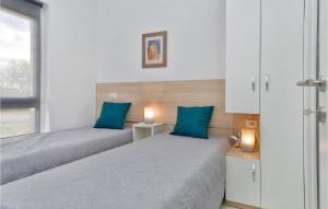 Postel nebo postele na pokoji v ubytování Three-Bedroom Holiday Home In Durdevac