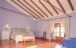 A bed or beds in a room at Gorgeous Home In Archidona
