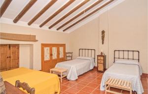 A bed or beds in a room at Gorgeous Home In Archidona