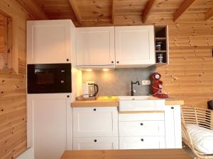Kuchyň nebo kuchyňský kout v ubytování Chalet Wielsmer