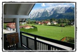 a balcony with a view of a mountain at Ferienwohnung Grimmingblick in Bad Mitterndorf in Bad Mitterndorf