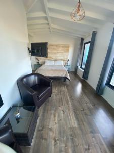 Postel nebo postele na pokoji v ubytování Hotel Trocadero