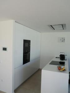 A kitchen or kitchenette at Ferienhaus "Casa del Mar" mit privatem Pool