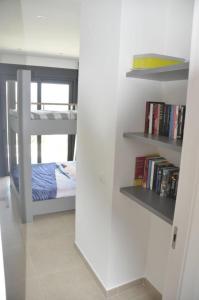 A bed or beds in a room at Ferienhaus "Casa del Mar" mit privatem Pool