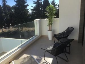 A balcony or terrace at Ferienhaus "Casa del Mar" mit privatem Pool