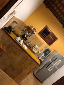 an overhead view of a kitchen with a refrigerator at Casa Girasol in Trairi