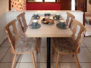 a table with a plate of food on it at Familienfreundliches Ferienhaus in Frielendorf in Frielendorf