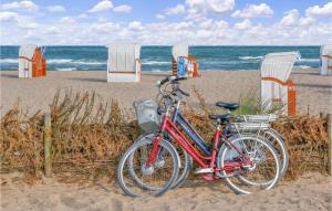 two bikes parked on the beach near the ocean at Lieblingsplatz in Olpenitz