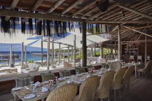 Restaurant o un lloc per menjar a Mandarin Oriental, Canouan