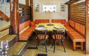 a dining room with a table and chairs at Ferienhaus 72 In Frankenau in Frankenau